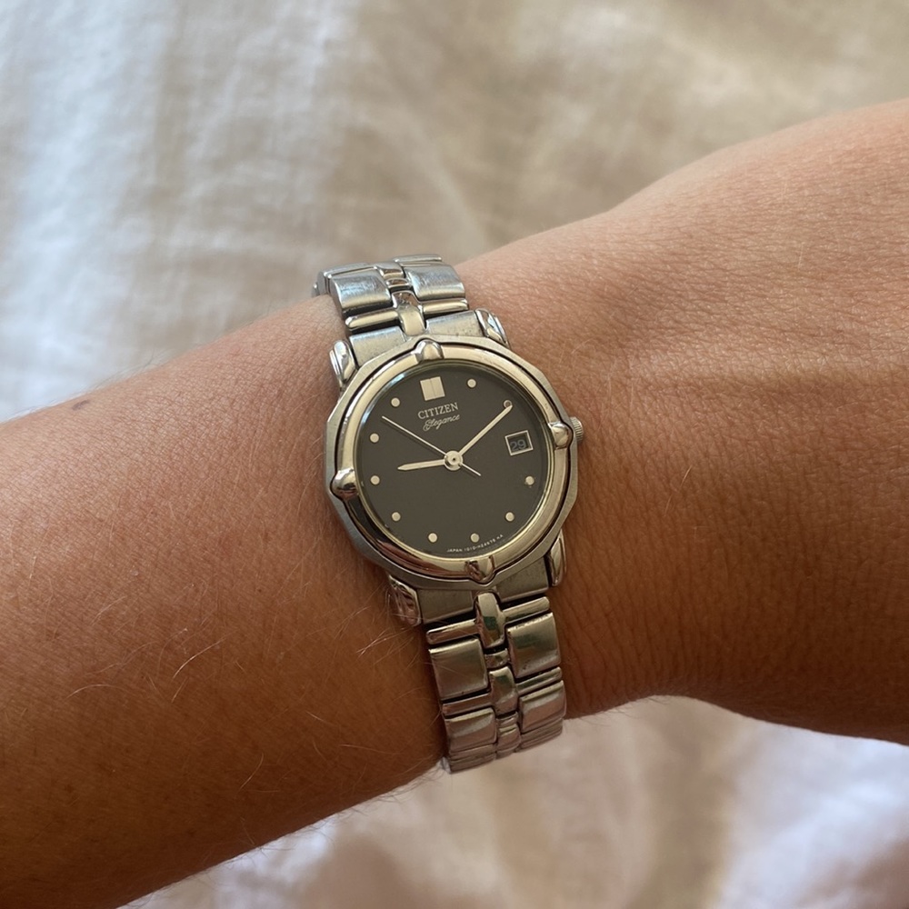 Citizen elegance stainless steel watch black face needs battery